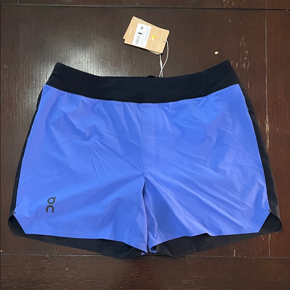 On Running men’s Vibrant Blue Shorts with Black Waistband